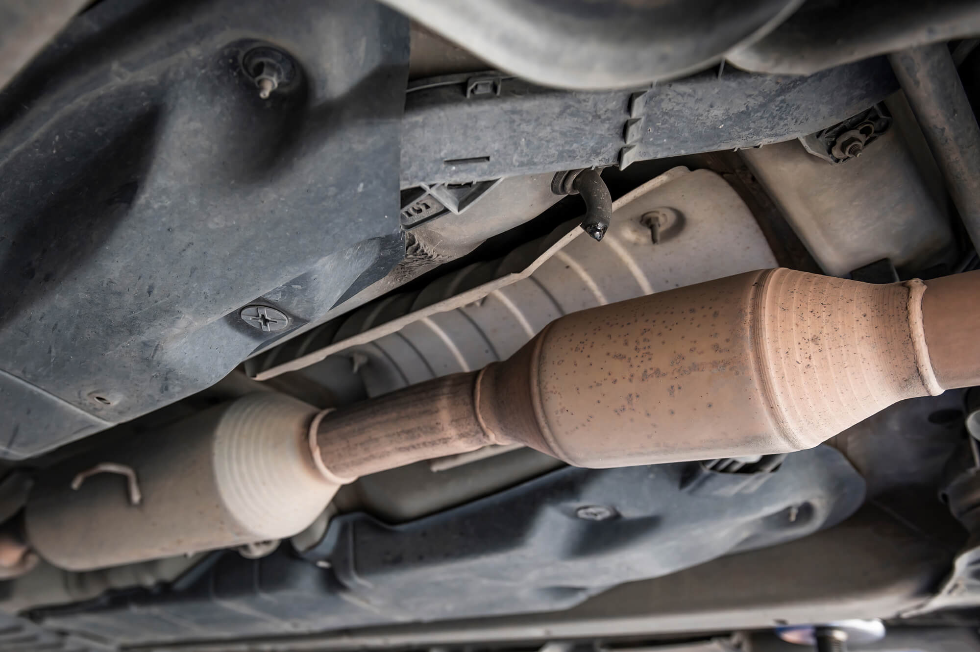 Where Is The Catalytic Converter On A Car