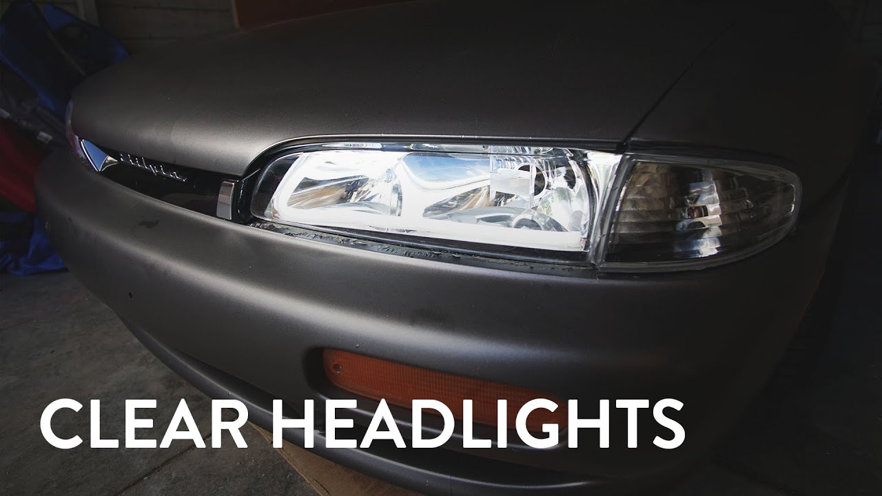 Application Of Yellow Laminate Film To 240sx Headlight Lenses