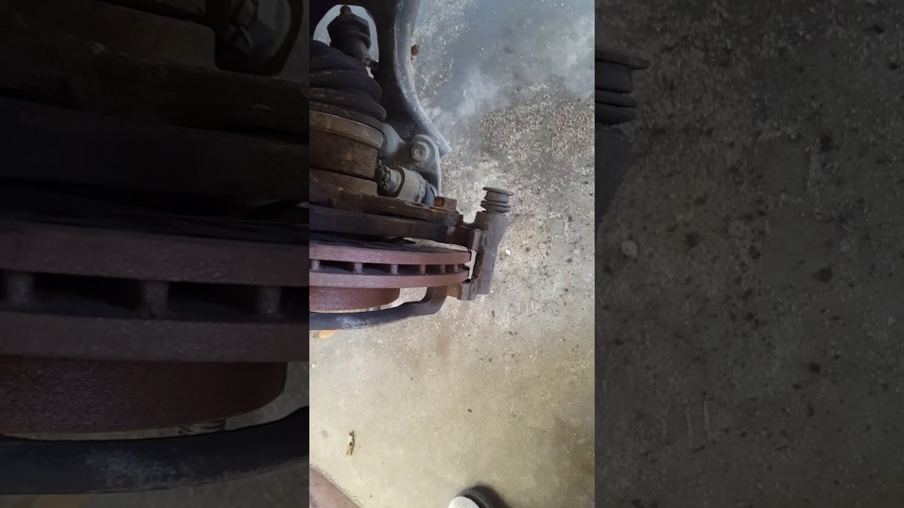 How To Remove A Stuck Caliper Bolt How to loosen a stuck caliper bracket bolt - YouTube