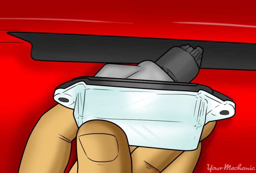 How To Change A License Plate Bulb How to Replace a License Plate Bulb | YourMechanic Advice