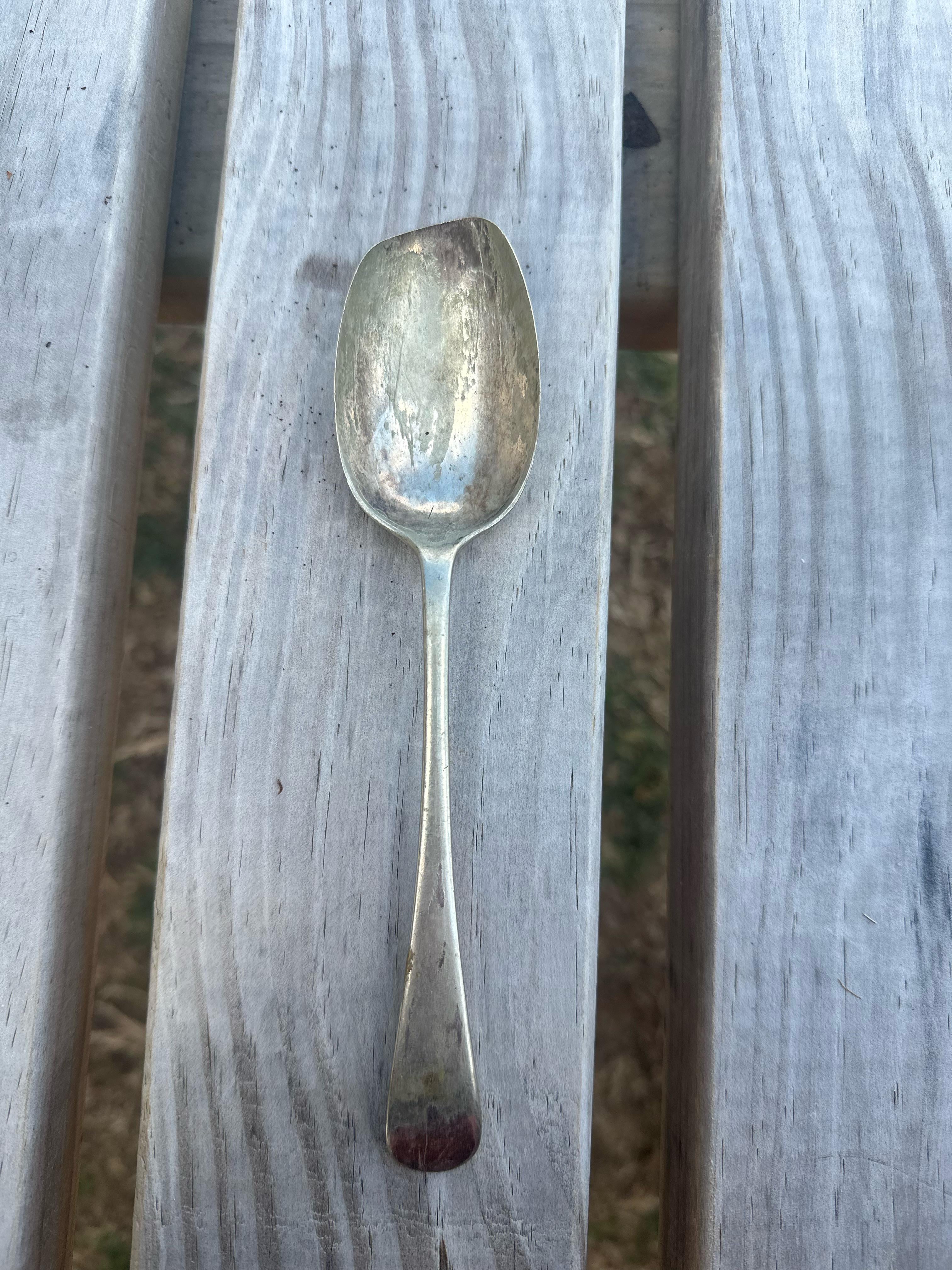 Spoon What Looks Like Metal Deformation