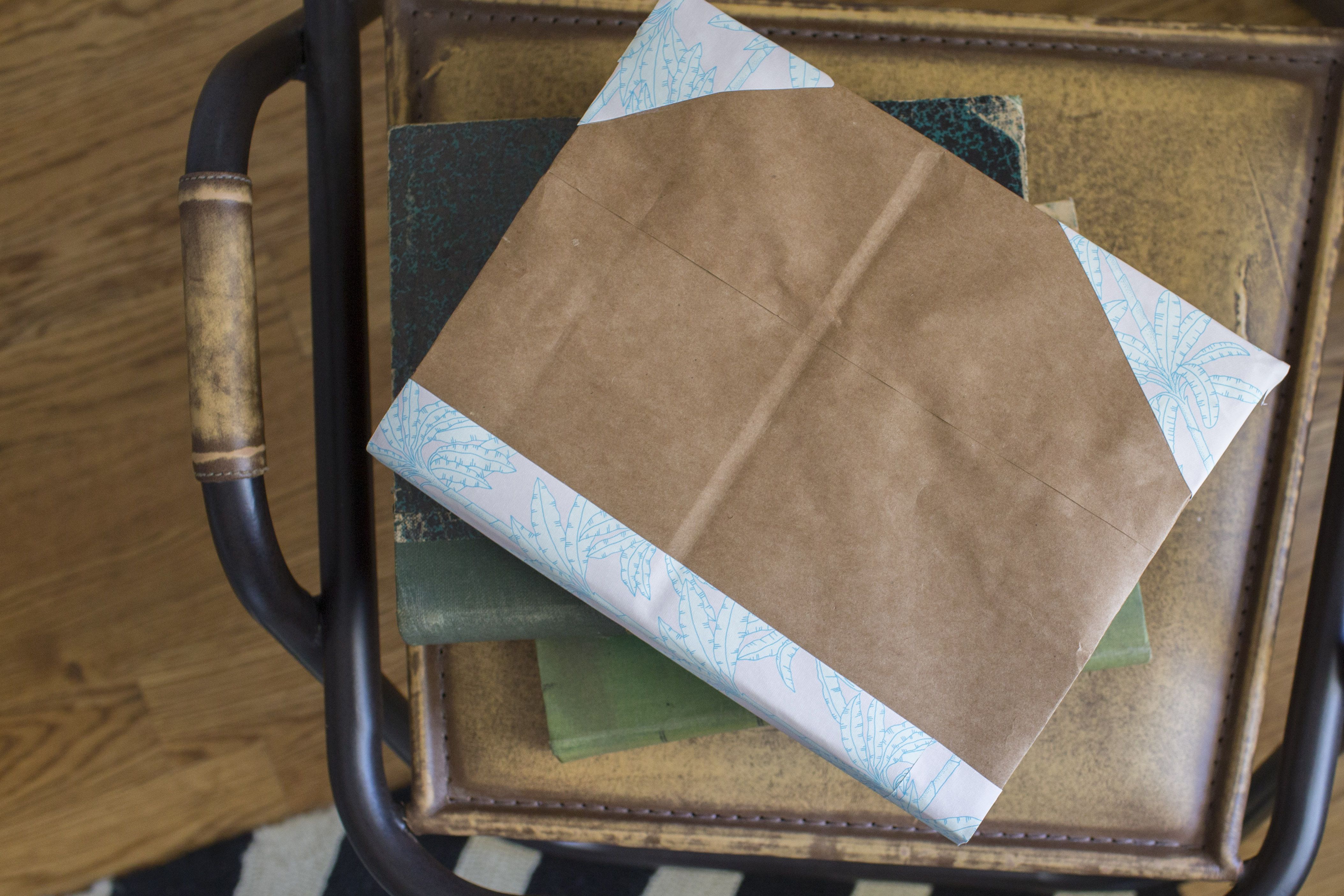 How To Make A Book Cover From Paper Bag Learn how to turn a brown paper shopping bag into a book cover in a few
