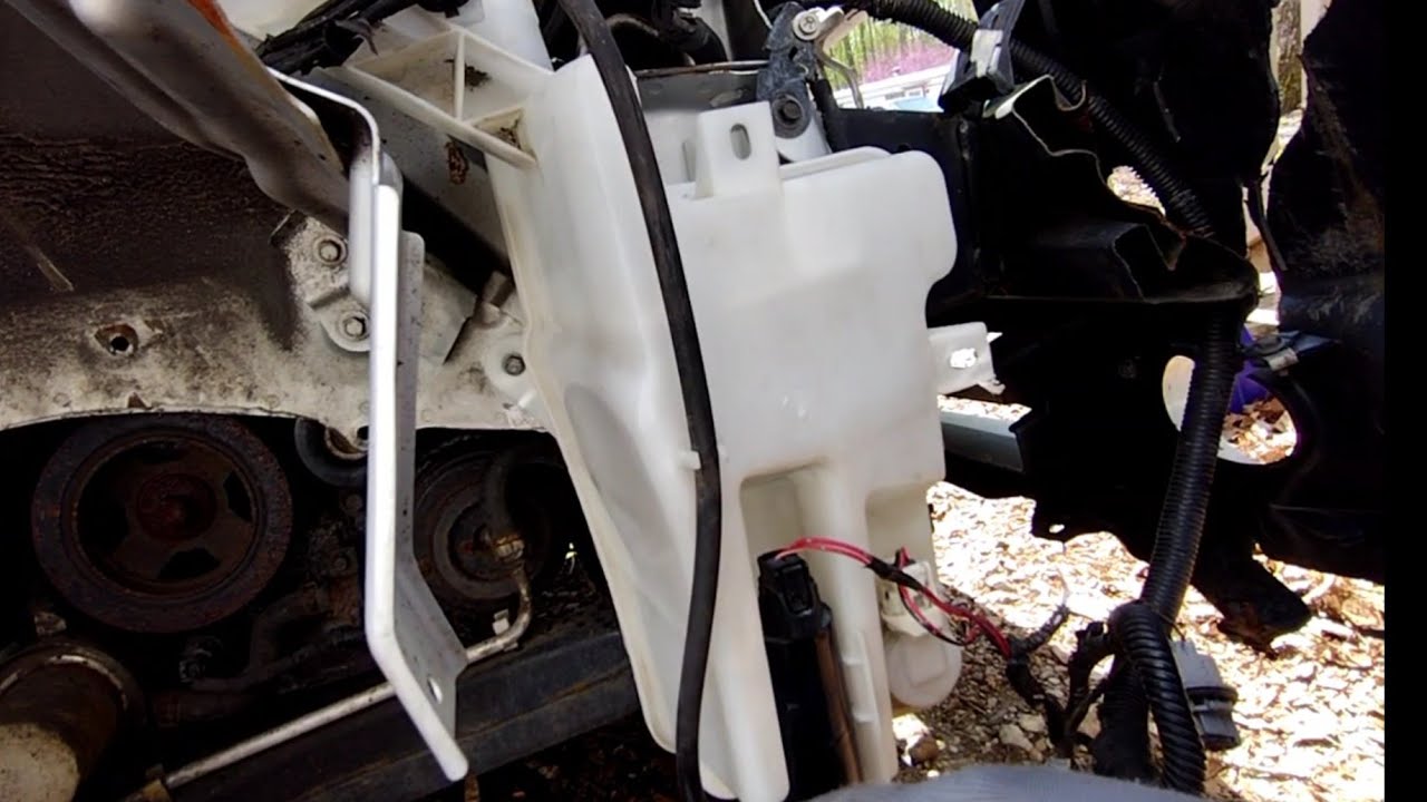 How To Replace A Washer Fluid Reservoir Nissan Washer Fluid Reservoir Replacement - YouTube