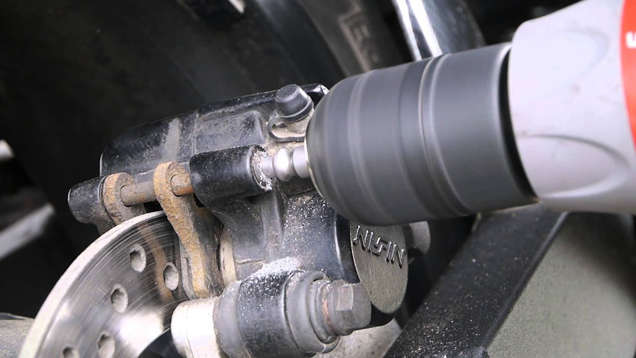 How To Remove Stuck Caliper Bolt Removing a stuck caliper pin cover - YouTube